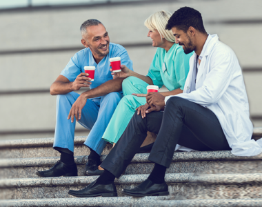 Physicians chatting on their lifestyle spending and better financial planning