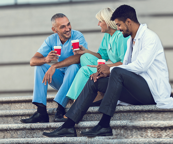 Physicians chatting on their lifestyle spending and better financial planning