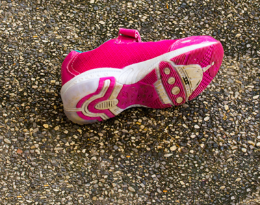 a seemingly inevitable event, a shoe on the side of the road