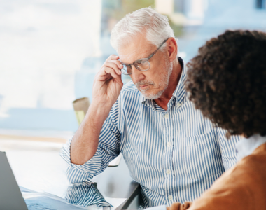 Tax advisor helping understand AMT